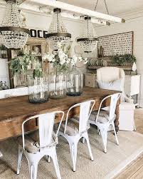 The smooth white of the ceramic collection of a pitcher, vase, and fruit bowl is complemented perfectly by the rough, dark wood of the. How To Give Any House Farmhouse Style Modern Farmhouse Dining Room Modern Farmhouse Dining Farmhouse Dining Rooms Decor