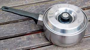 A metal container of moderate depth, usually having a long handle and sometimes a cover, for stewing, boiling, etc. Saucepan Wiktionary