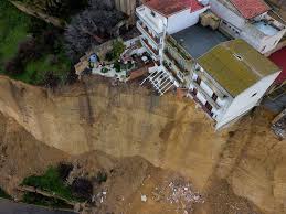 Residents forced to abandon Sicilian homes teetering on crumbling cliff edge  | The Independent