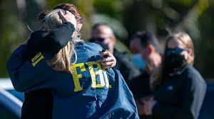 A team of law enforcement officers. Two Fbi Agents Shot Dead Serving Warrant In Florida Raid Miami Herald