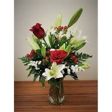 When it comes to white wedding flowers, the options are nearly limitless. Red Roses With White Lilies By The Purple Orchid