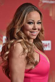 Carey as seen here, takes advantage of her length by incorporating a middle part. Mariah Carey Long Hairstyles Mariah Carey Hair Stylebistro