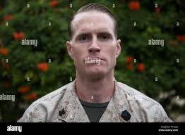 Hospital Corpsman 2nd Class Robert Park, a combat trauma management  instructor with the 1st Marine Division Surgeon's Office, poses for a  portrait aboard Marine Corps Base Camp Pendleton, Calif., April 7, 2016.