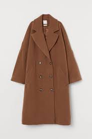 Notched lapels, concealed snap fastener at front, and front pockets. Double Breasted Wool Mix Coat Camel Ladies H M Gb