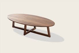 Midcentury oval coffee tables fashioned from wood strike a nice balance, as they'll add warmth to the room without feeling overbearing. Speke Klein Finn Oval Coffee Table Modern Oval Coffee Table