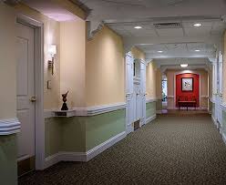 Red Panels Acts As An Orientation And Wayfinding Device Arbor Acres Asbury Memory Care Center Image Credit Memory Care Memory Care Unit Long Term Care Homes