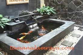 Taman di halaman belakang rumah minimalis jpg 550 413 kolam ikan rumah dan kebun taman halaman. Tukang Kolam Ikan Koi Surabaya Kolam Minimalis Elegan Taman Alam Raya