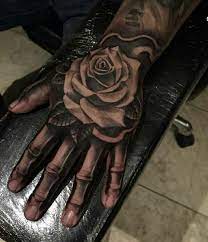 The tattoo is a tribute to cheyne, miley's best friend and a personal assistant who has the same tattoo on his wrist. Rose On Skeleton Hand Rose Hand Tattoo Hand Tattoos For Guys Rose Tattoos For Men