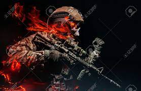 Photo Of A Fully Equipped Military Burning Skeleton Soldier In Armor Vest  With Rifle Attacking On Black Background. Stock Photo, Picture and Royalty  Free Image. Image 160023237.