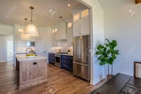 Beautiful victoria quartz countertops complete the bright yet homely atmosphere of this dallas home. Beautiful Kitchen With Floor To Ceiling Custom Built Cabinets Stock Photo Picture And Royalty Free Image Image 147537832