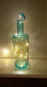 Empty Silent Pool Gin Bottle With Micro Fairy Lights Wine Bottle Diy Crafts Bottle Fairy Lights Bottle Crafts