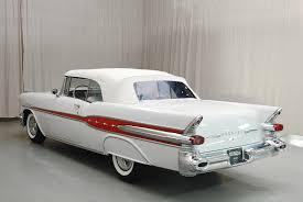 Image result for Starlight Yellow 1957 Pontiac