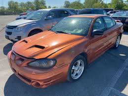 Image result for Sunburst Orange 2004 Pontiac