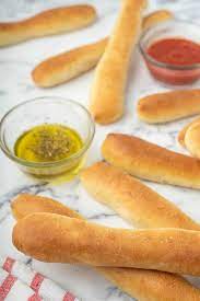 Meanwhile, in a small bowl whisk together 1/4 tsp salt and garlic powder. Soft Garlic Olive Garden Breadsticks Recipe Copycat