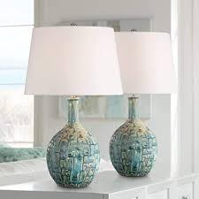 It was a time when new materials such as plastic, stainless steel, and lucite were incorporated into furniture pieces, and new techniques were enthusiastically. Mid Century Modern Contemporary Table Lamps Set Of 2 Ceramic Teal Glaze Handcrafted White Empire Shade For Living Room Bedroom House Bedside Nightstand Home Office Family 360 Lighting Amazon Com