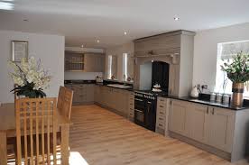 Pin By Schofield Interiors Limited On Buckingham Stone Grey Ash With Black Granite Worktops Smeg Victoria Range Cooker Stone Kitchen Kitchen Granite Worktops