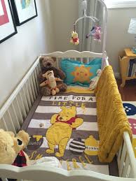 Mustard Yellow Winnie The Pooh Nursery Winnie The Pooh Nursery Baby Room Themes Disney Themed Nursery