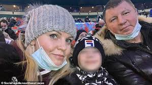 Pictured: Lawyer swept to her death in front of her children when she  jumped into a Russian ice hole