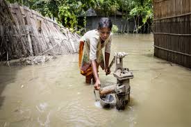 An overflowing of water onto land that is normally dry. Flood Relief Unicef Usa