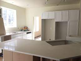 Keyword for kitchen cabinets marysville wa. White Painted Kitchen Cabinets And Frost White Quartz Counters The Layout Was Designed With The Home Owners Home Painting Kitchen Cabinets Custom Homes
