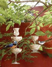 You Ll Never Look At A Wine Glass The Same Way Again Glass Bird Feeders Upcycle Garden Teapot Birdhouse