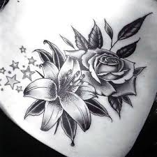 Black And White Lily Tattoo Men Black Lily And Rose Tattoo Design In 2020 Tattoos For Women Flowers Rose Tattoo Design Lily Tattoo
