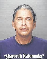 Newspaper hostage-taker among those charged in raid