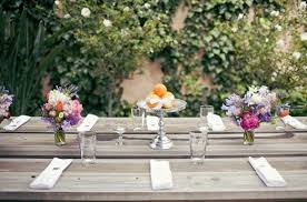 This simple craft project is ideal for clearing out and recycling all your old jars. A Simple Way To Decorate Your Wedding Reception Tables With Jars Of Seasonal Flowers And Cake Stand Arrangements The Natural Wedding Company The Natural Wedding Company