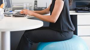 The idea of sitting on an exercise ball instead of a traditional office chair is that the instability of an exercise ball requires the user to increase trunk muscle activation and thus increase core strength, improve posture and decrease discomfort. The Real Truth About Using An Exercise Ball As An Office Chair
