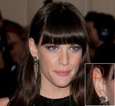 Why was Galadriel not present at Aragorn's coronation?