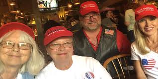 Protesters in MAGA hats descend