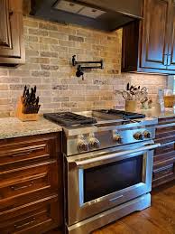 Again, the glass lighting fixtures are always a great idea combining with shiny ceramics! Granite Kitchen Countertops Kitchen Backsplash Designs Granite Countertops Kitchen Stained Kitchen Cabinets