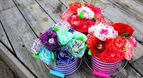 Once you have the flowers finished, string them up onto twine. One Ginormous Adventure Cupcake Liner Bouquet Of Flowers Flower Crafts Cupcake Liner Flowers Paper Flowers Diy