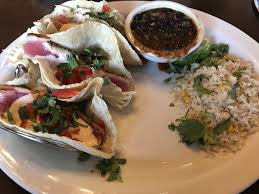 The tortilla is then folded around the filling and eaten by hand. Uncle Julio S Forking Orlando