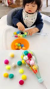 Kitchen Whisk Baby Fine Motor Skills Toddler Learning Activities Baby Sensory Play Baby Play Activities