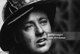 Firefighter Willie Knapp resting after a fire is extinguished in the...  News Photo