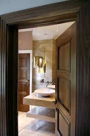 Walnut Panelled Doors In Burwood Refurbishment Wooden Bathroom Bathroom Doors Wooden Doors Interior