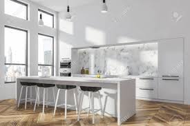 For marble kitchen countertops, however, nussbaum generally recommends sticking with white marble. Corner Of Modern Kitchen With White And White Marble Walls Wooden Stock Photo Picture And Royalty Free Image Image 113595565