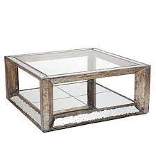 With a metallic finish, this piece goes with anything. Decor Design Tips Coffee Table Mirrored Coffee Tables Mirrored Furniture
