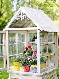 Once you have collected quite a few, lay them down and with the windows laid out, create a guide and construct the frame for each of the four walls. Diy Backyard Mini Greenhouse Hgtv