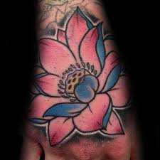 Top 103 Lotus Flower Tattoo Ideas 2020 Inspiration Guide Lotus Hand Tattoo Lotus Flower Tattoo Design Flower Tattoo Designs