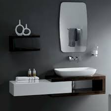 Like a bathroom pedestal sink, a console sink often takes up less space than a vanity, which keeps half baths and small bathrooms from feeling cramped. K54 Apartment A Stylish Apartment Designed With Black White And Modern Interior Bathroom Design Small Modern Modern Small Bathrooms Bathroom Vanity Designs