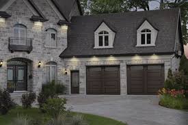 Moka Brown Garage Door Colors On A Stone House Porte De Garage Brun Moka Sur Maison De Pierre Black Garage Doors Garage Doors