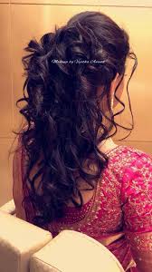 These long gorgeous braids, wrapped around or straight down, highlight an organic yet trendy look. South Indian Bridal Hairstyle For Reception Hairstyle By Vejetha For Bridal Hairstyle For Reception Indian Wedding Hairstyles Wedding Hairstyles For Long Hair