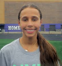 Downers Grove North freshman runner Macy Ermitage, after missing most of XC  season, back in a big way