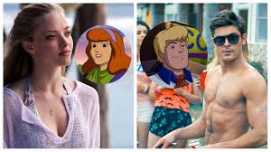 Investigating the plans of a masked villain who wants to control the city of coolsville using a machine to create monsters. Animated Scooby Doo Film Finds Its Freddy And Daphne