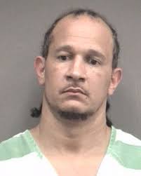 Suspect arrested in theft of UF swim coach's credit cards