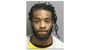 Police locate and arrest home invasion suspect