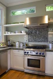 Like The Idea Of Glass Tiles Behind Stove Up To Hood And Then Subway Tile As Backsplash Kitchen Backsplash Designs Contemporary Kitchen Trendy Kitchen Tile