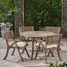 Sie möchten günstig aktien handeln? Noble House Pines Teak Brown 5 Piece Wood Outdoor Dining Set With Blue Cushions 42969 The Ho Patio Dining Set Outdoor Dining Set Outdoor Dining Table Setting